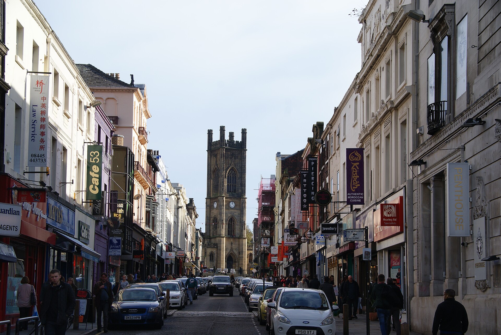 Bold Street in Liverpool looking towards St Luke's Church with shops lining both sides