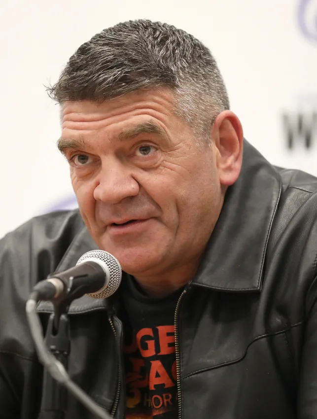 Actor Spencer Wilding speaking at a comic convention panel