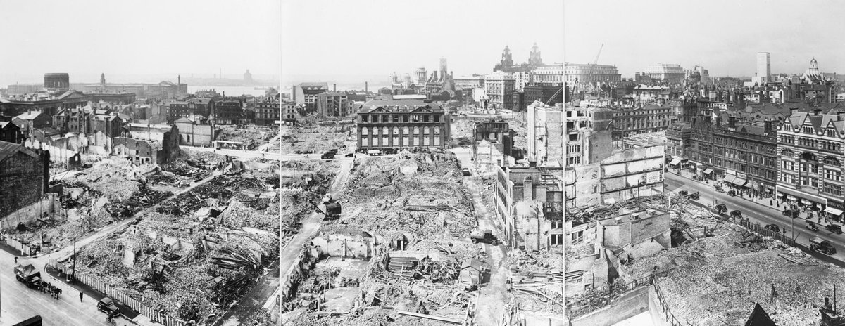 Aerial view of bomb-damaged buildings and rubble in Liverpool city centre after a German air raid.