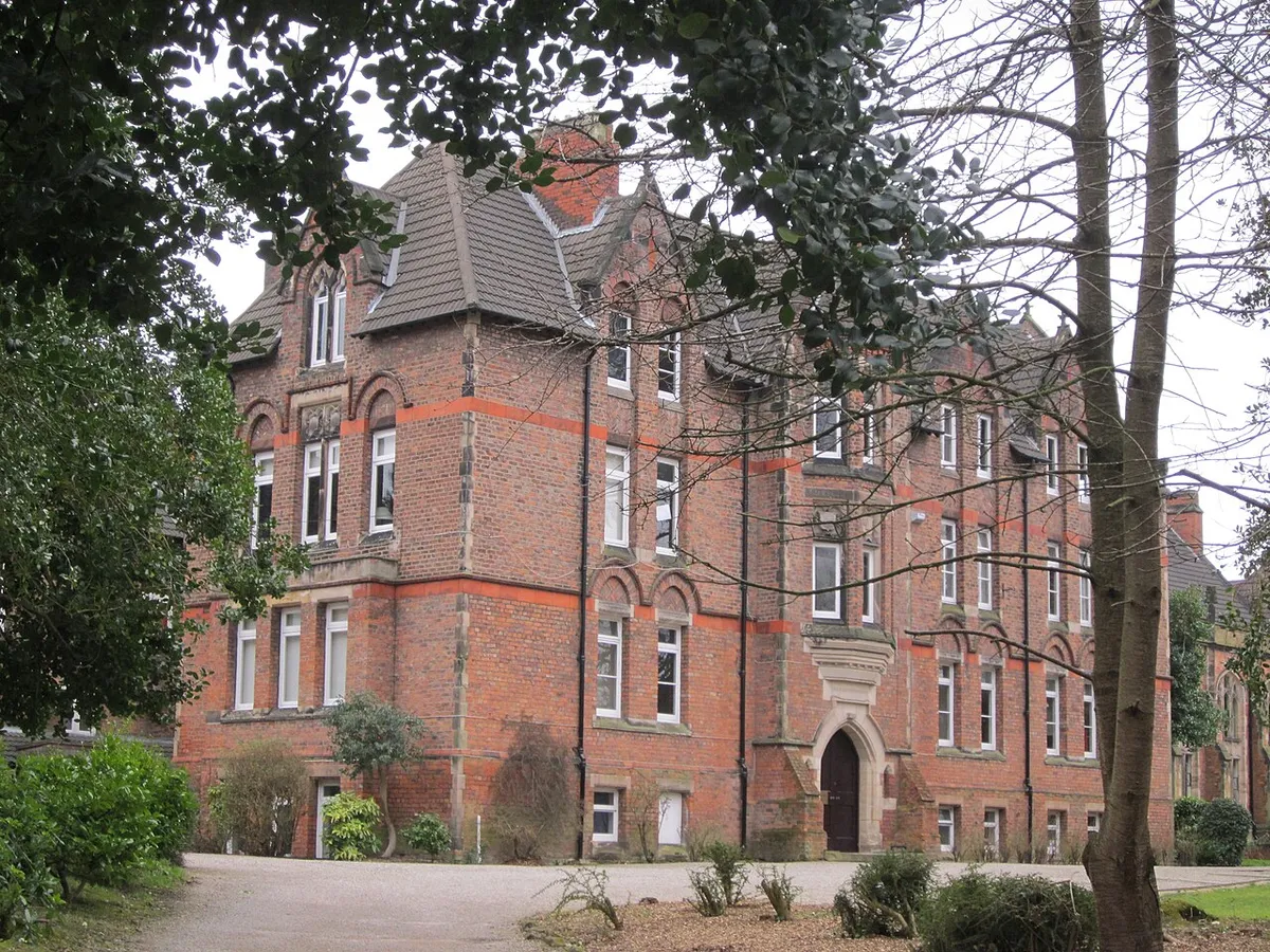 A brick and stone building of Birkenhead School on Shrewsbury Road in Oxton, Wirral