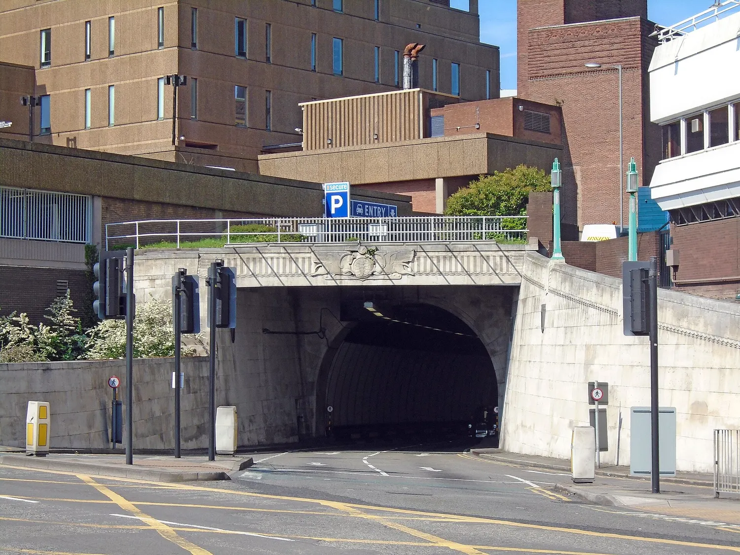 The dock branch exit of the Queensway Tunnel in Liverpool, a stone portal beside the dock road