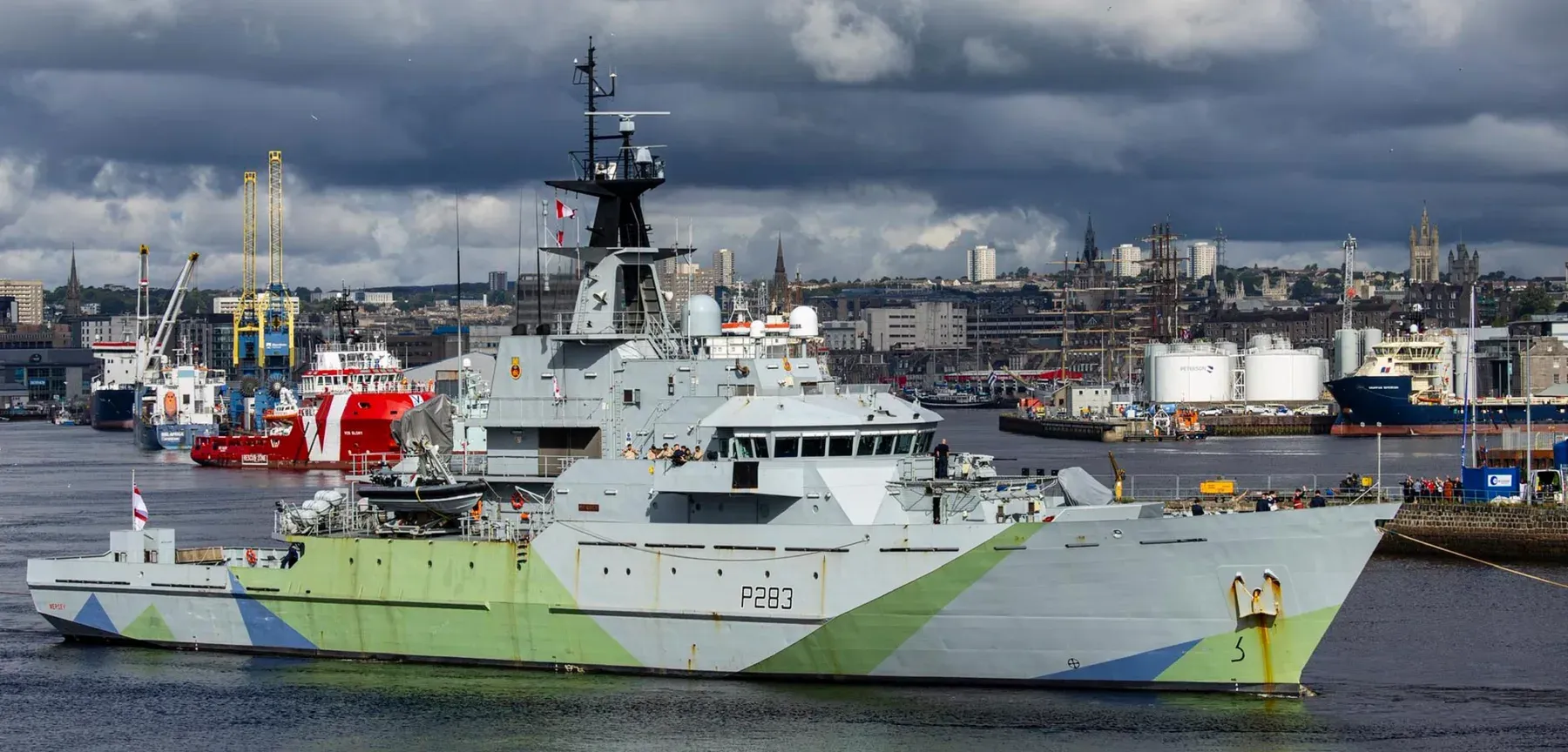 HMS Mersey in Western Approaches camouflage on the River Mersey
