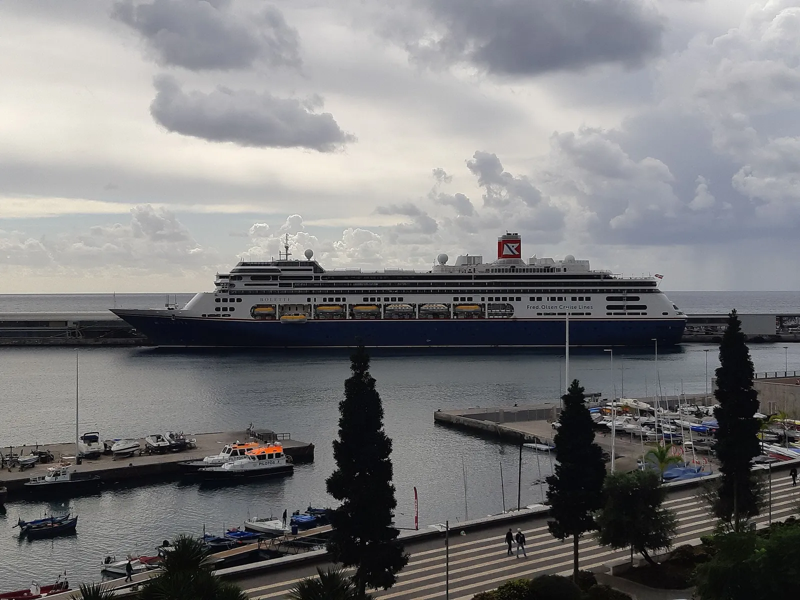The Fred. Olsen cruise ship Bolette with a dark hull, berthed at Funchal harbour in Madeira