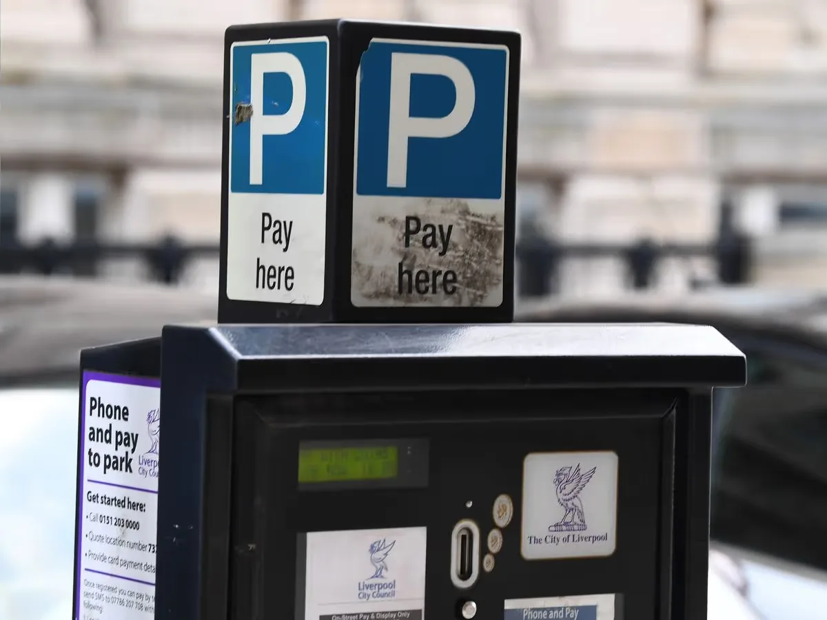 Liverpool City Council pay-and-display parking machine with two blue P signs and Pay here labels.