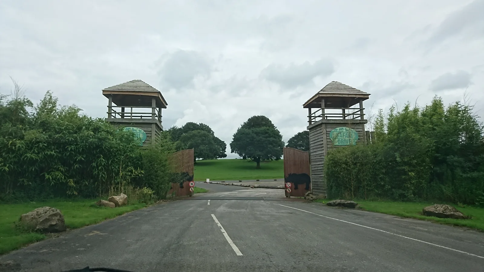 The entrance to Knowsley Safari Park, with signage and road approach