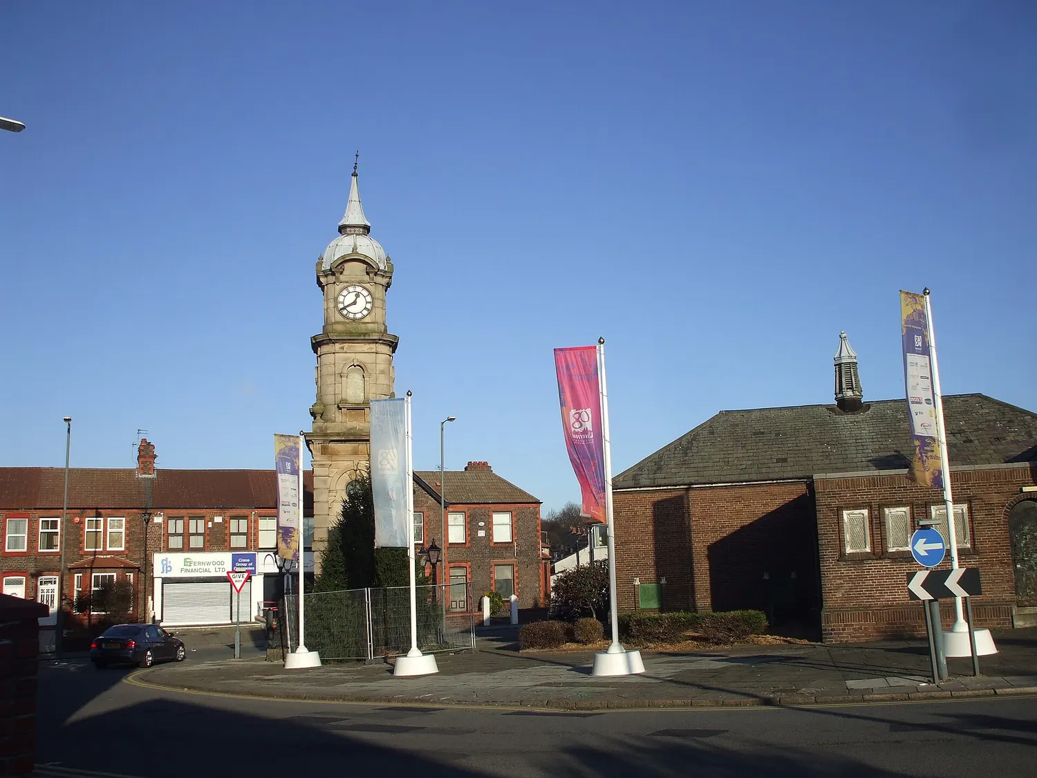 The Picton Clock Tower in Wavertree, a tall Victorian stone clock tower at a road junction