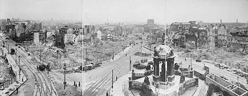 Panorama of bomb-damaged central Liverpool, with the Victoria Monument standing among cleared ruins