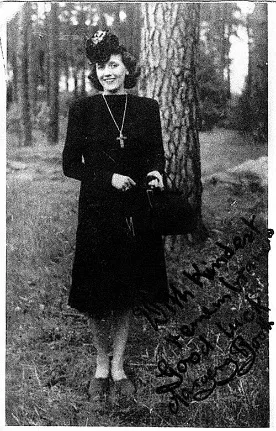 Signed portrait of a woman in a dark dress standing beside a tree