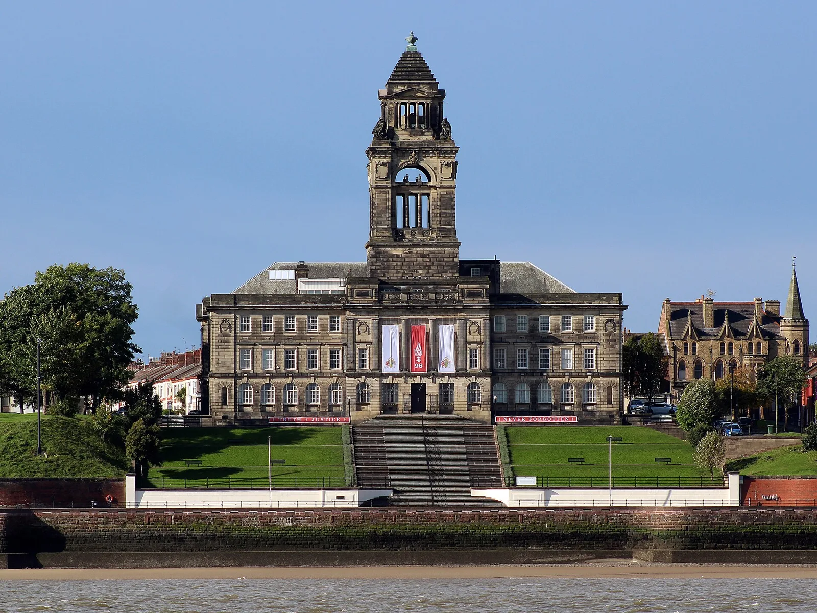 Wallasey Town Hall, the red brick and stone home of Wirral Council, seen from across the road